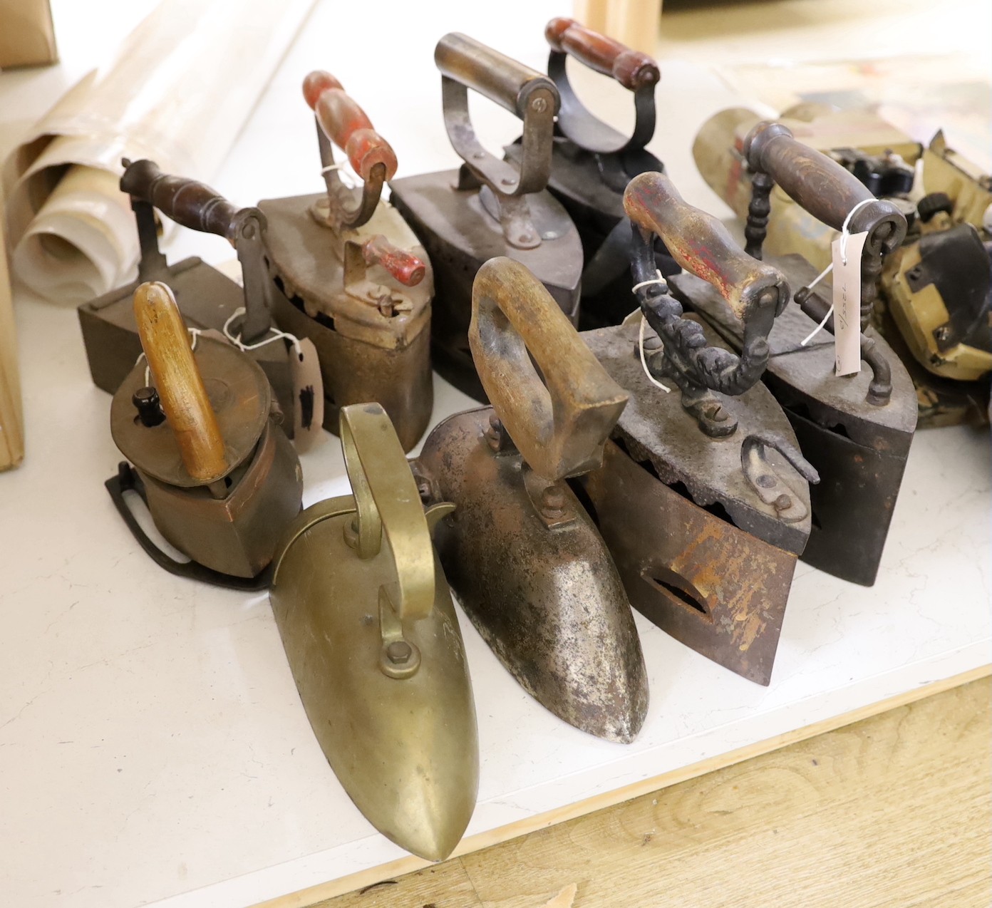 Nine various slug irons, tallest 22cm